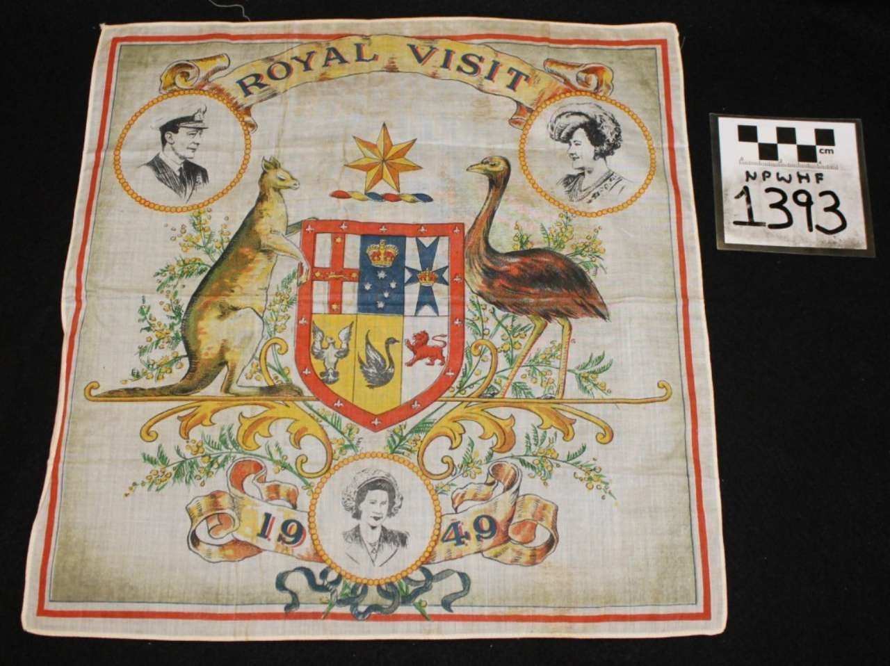 Royal visit commemorative embroidery with a central crest, kangaroo and emu, and “1910” below