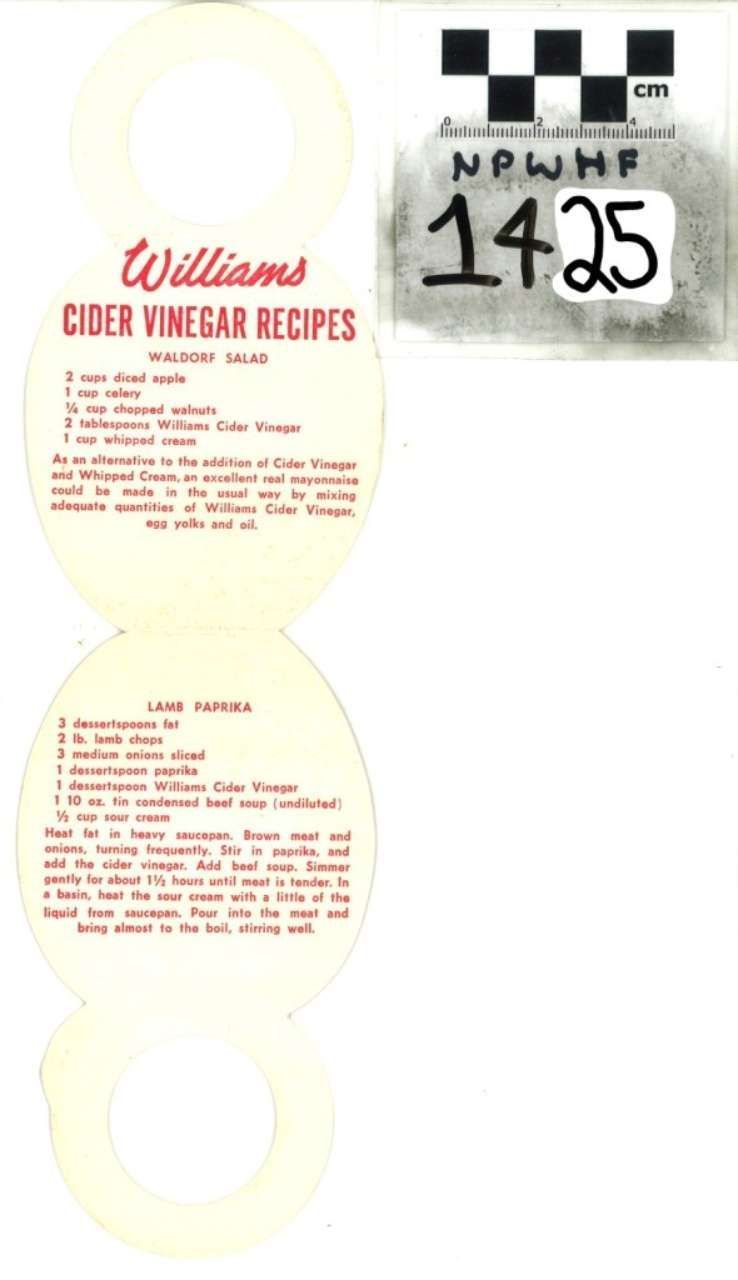 Wine bottle label with “Williams’ Slice Finger Recipes” and a handwritten 1425 tag on white background