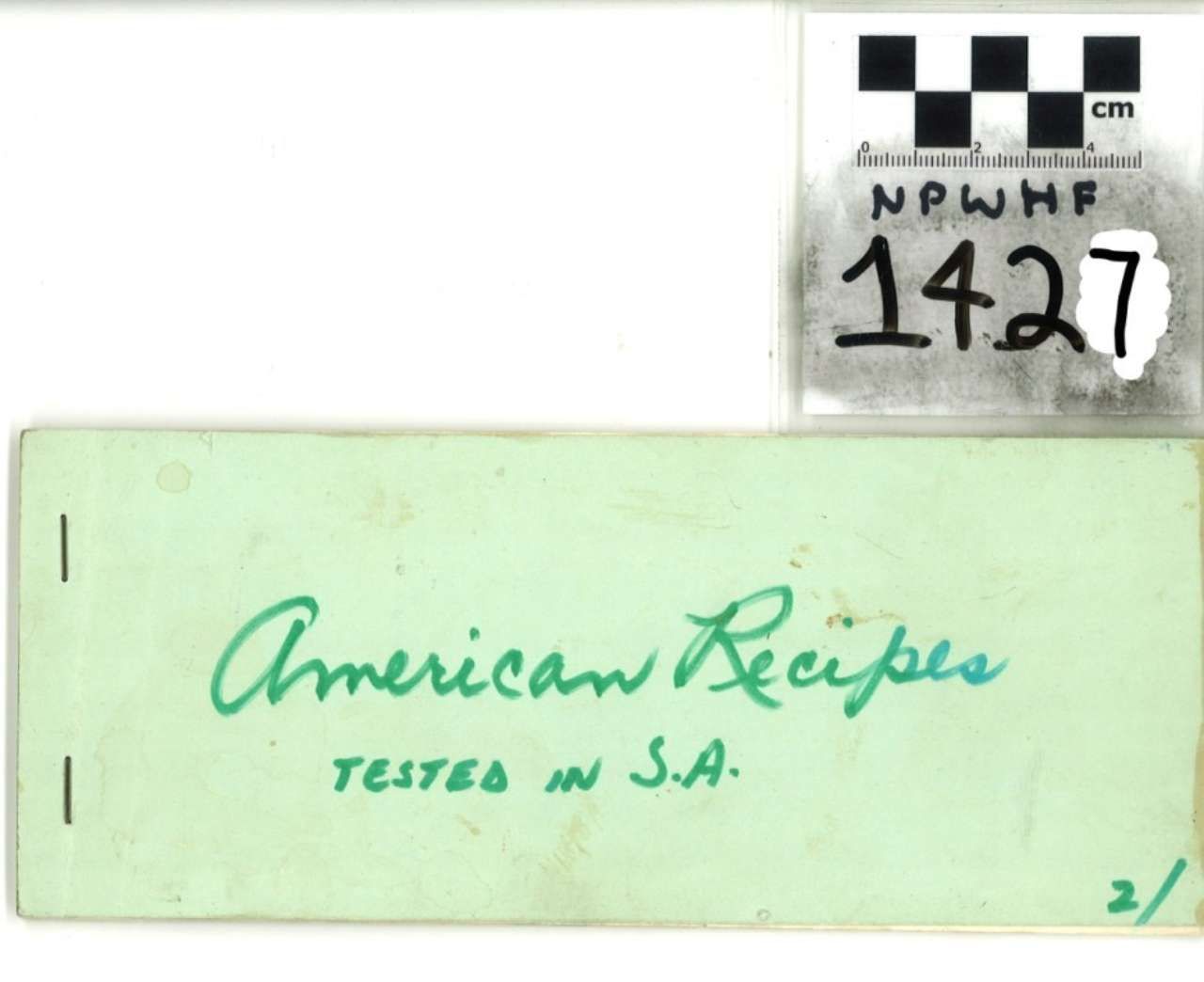 Green folder labeled “American Recipes tested in S.A.” with archive tag 1427