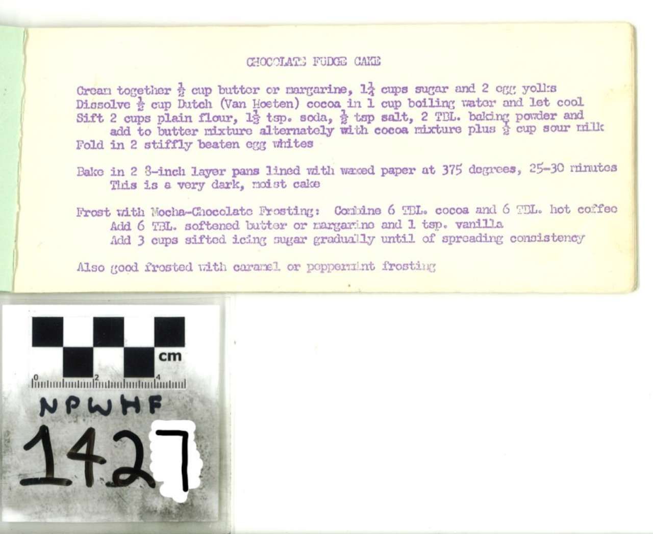 Yellow handwritten note above a black-and-white evidence marker labeled “1427” with a centimeter scale.