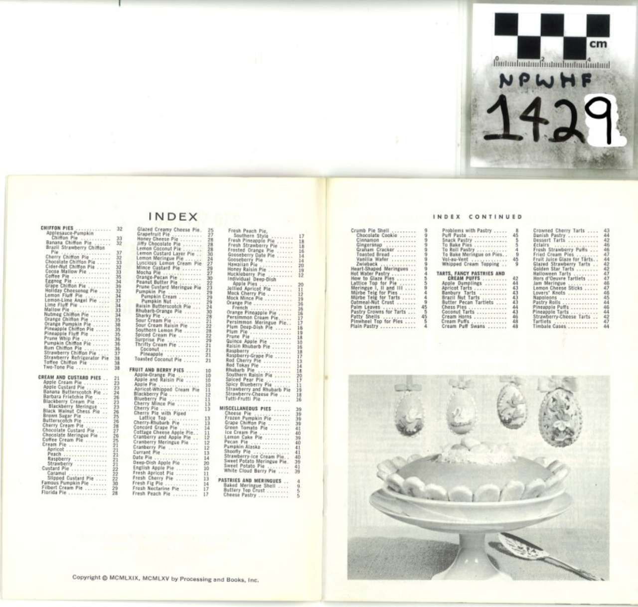 Open book page with index and cake illustration; handwritten label 1429 in the corner