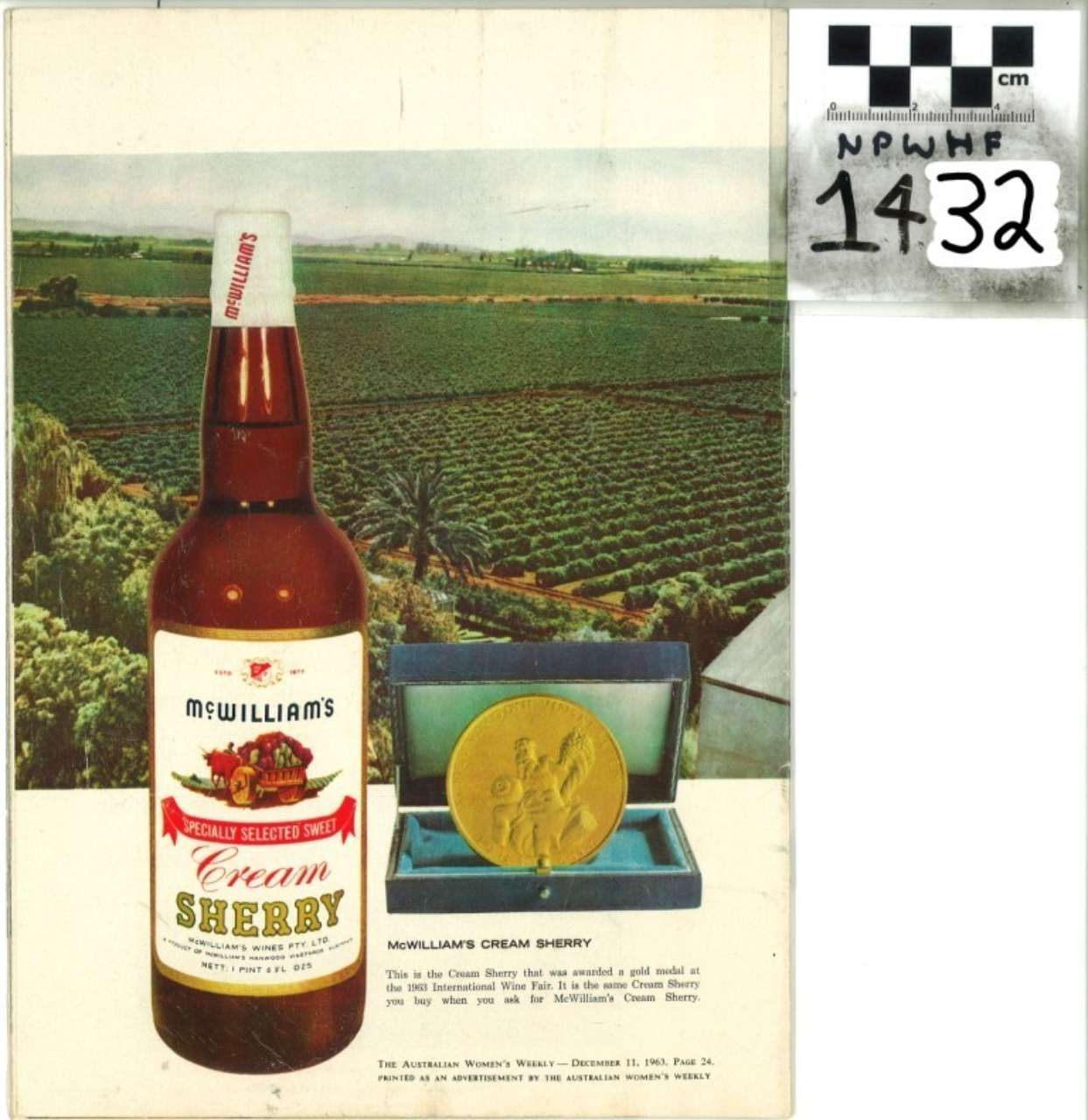 Bottle of “Cream Sherry” beside a gold medal on a landscape-themed product ad.