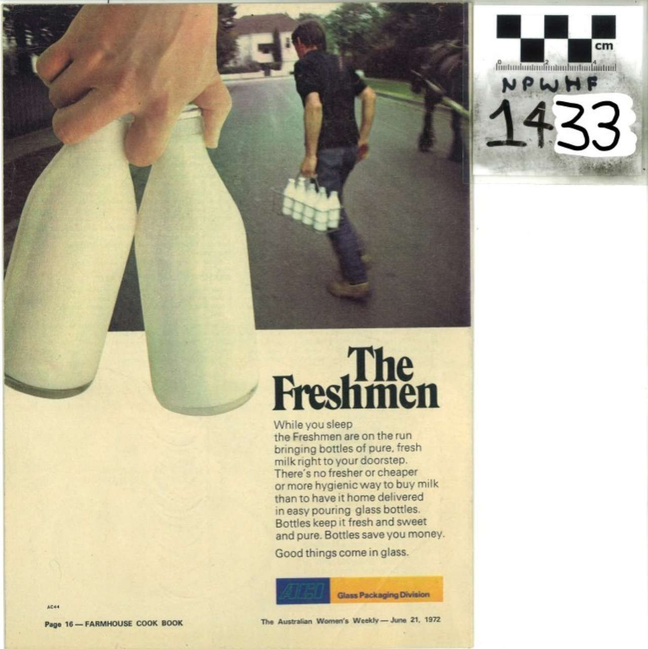 Person carrying white bowling pins on a road; ad layout reads “The Freshmen” with number 1433.