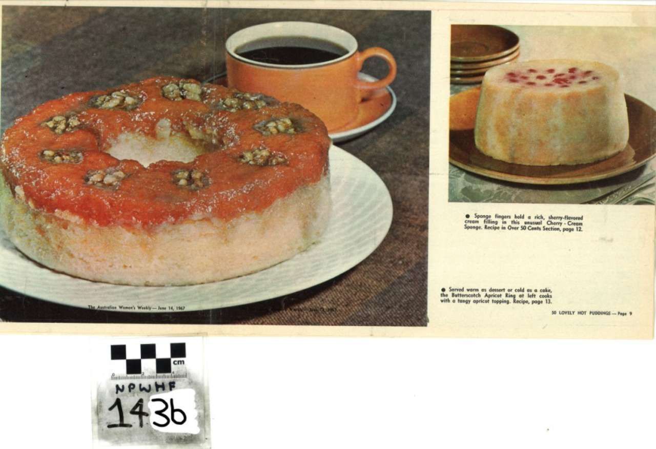 Strawberry-topped cake on a plate beside a cup of coffee, with a smaller cake inset on the right.