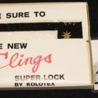 Close-up of a box labeled “The New Clings Super-Lock” with a black-and-gold starburst logo.