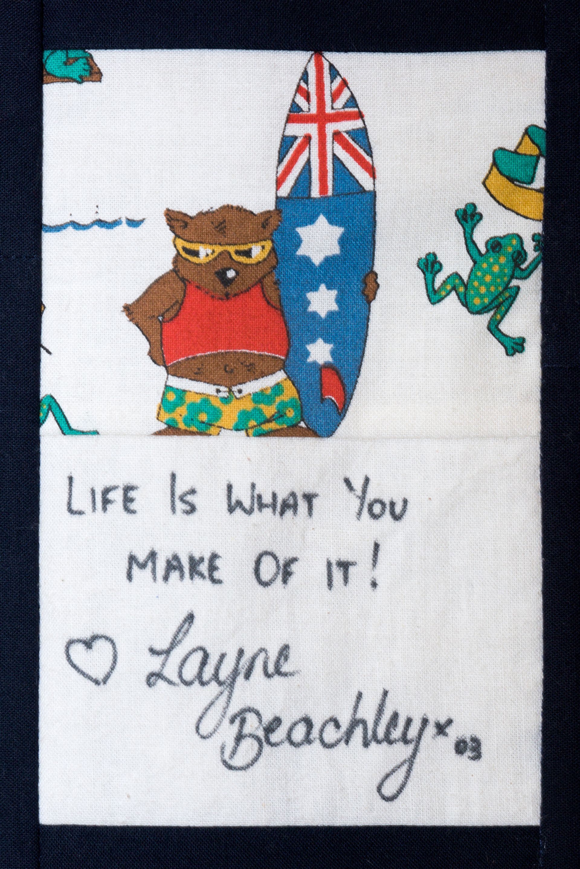 Handmade card with owl and surfboard, reading “Life is what you make of it!” signed Layne Beachley x