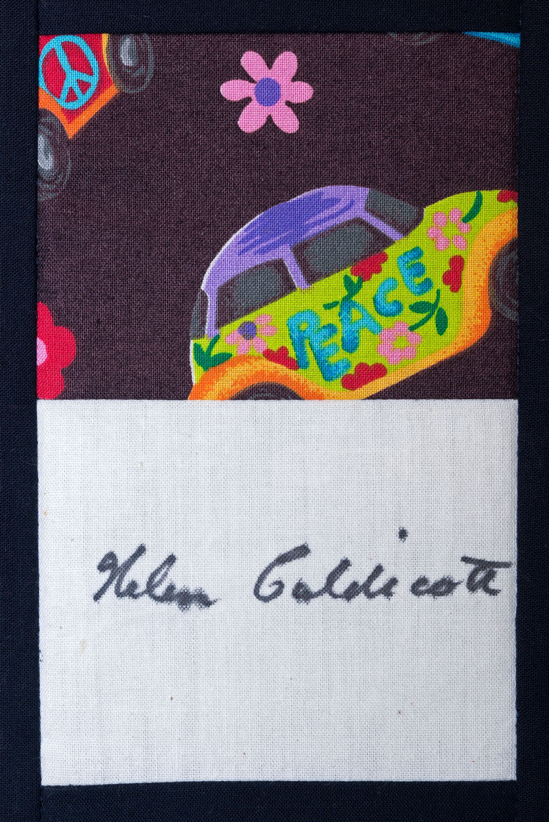 Colorful patchwork with flowers and a white panel signed in black cursive