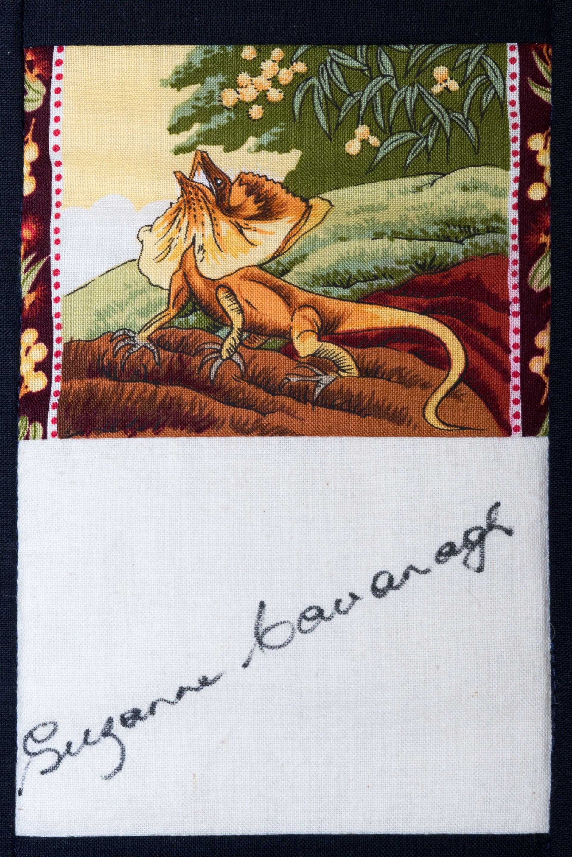 Lion cub and adult lion in a forest scene above a signature on white cloth