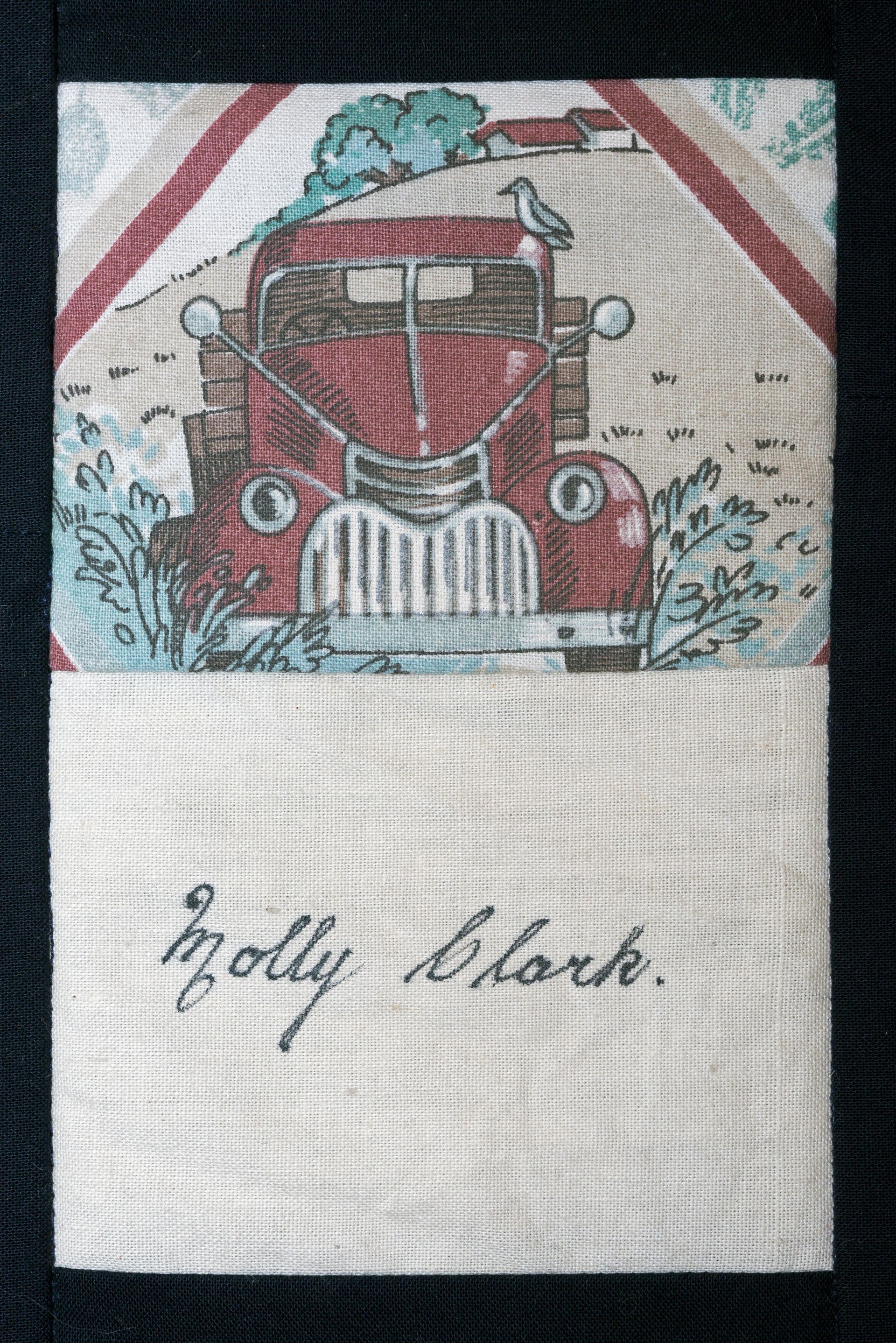 Vintage red fire truck illustration with handwritten label “Molly Black.”