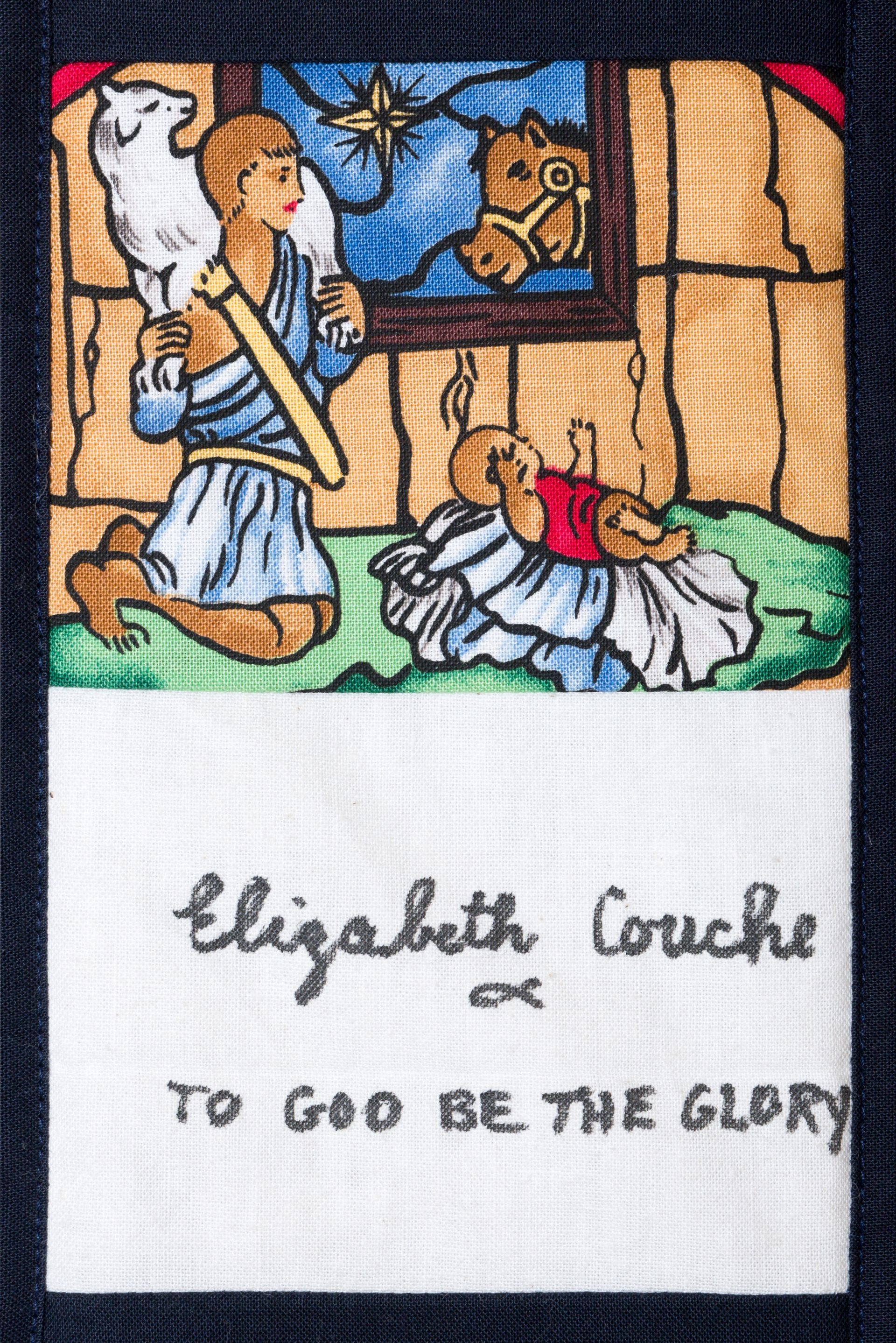 Quilt panel of an angel and child above text reading “Elizabeth Crouse to God be the glory”