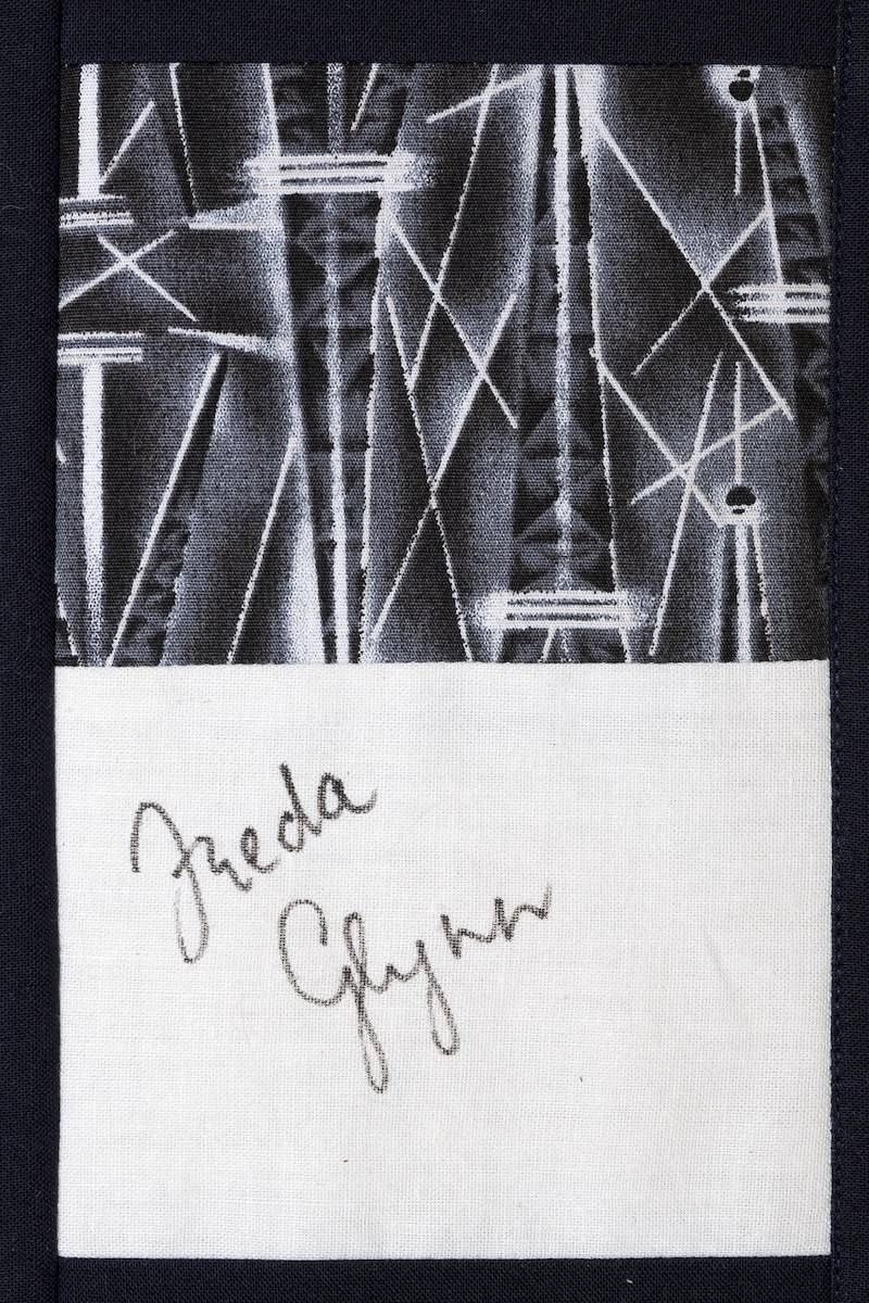 Abstract black-and-white scribbles above a white note with a handwritten signature.