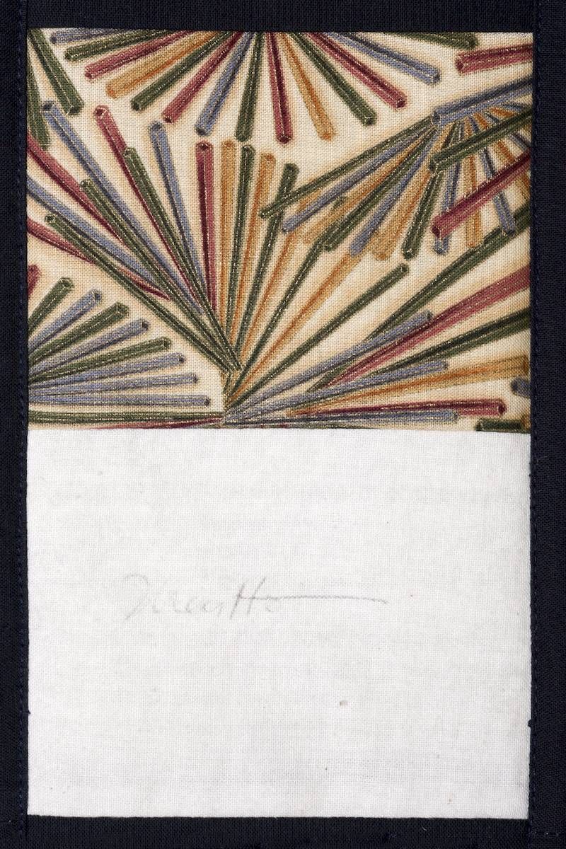 Abstract fan of multicolored striped leaves above a blank white card with faint handwriting