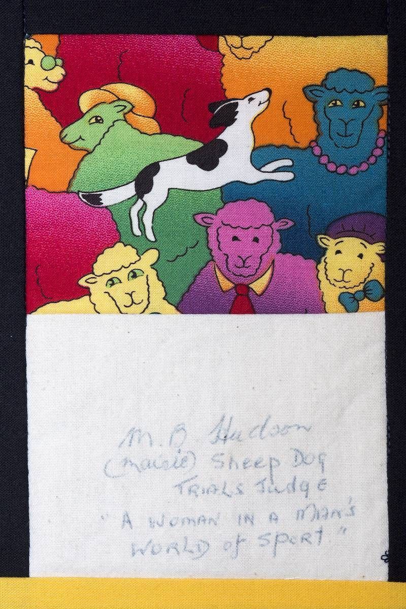 Colorful drawing of six cartoon animals on a textured background above faint handwritten notes