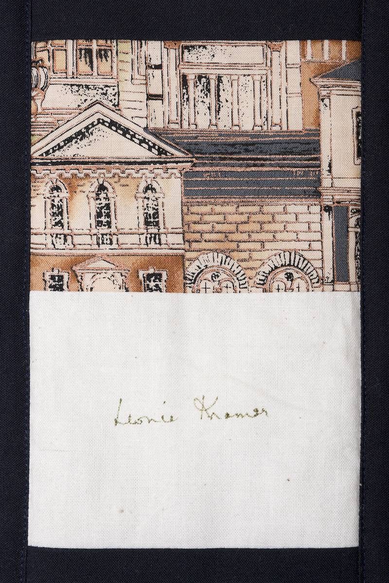 Sketch of a building facade on paper with a blank lower half and faint handwritten text