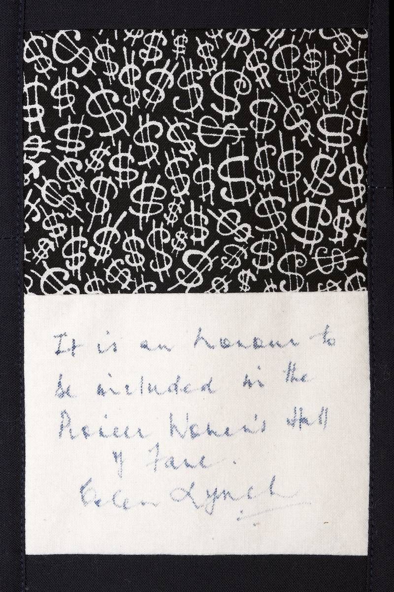 Two-panel note: black patterned cover above and a white handwritten note below.