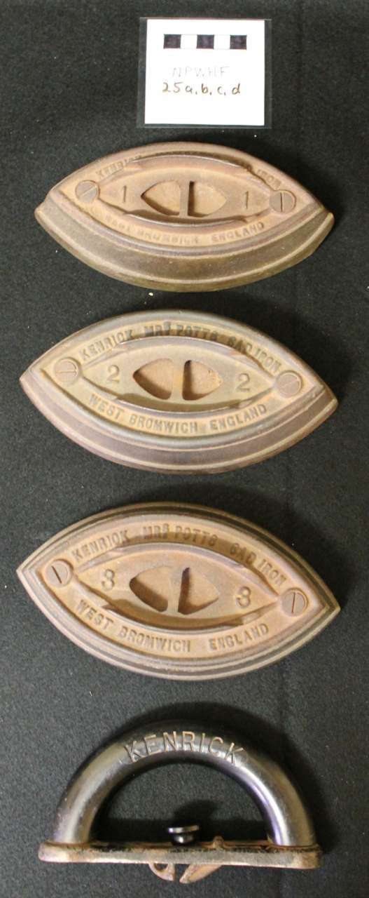 Four vintage oval metal lighters in beige, gold, and black, stacked vertically on a dark background