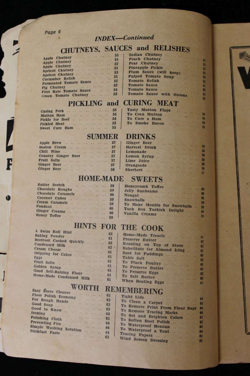 Open book page with small printed text and bold headings, likely a directory or catalog page.