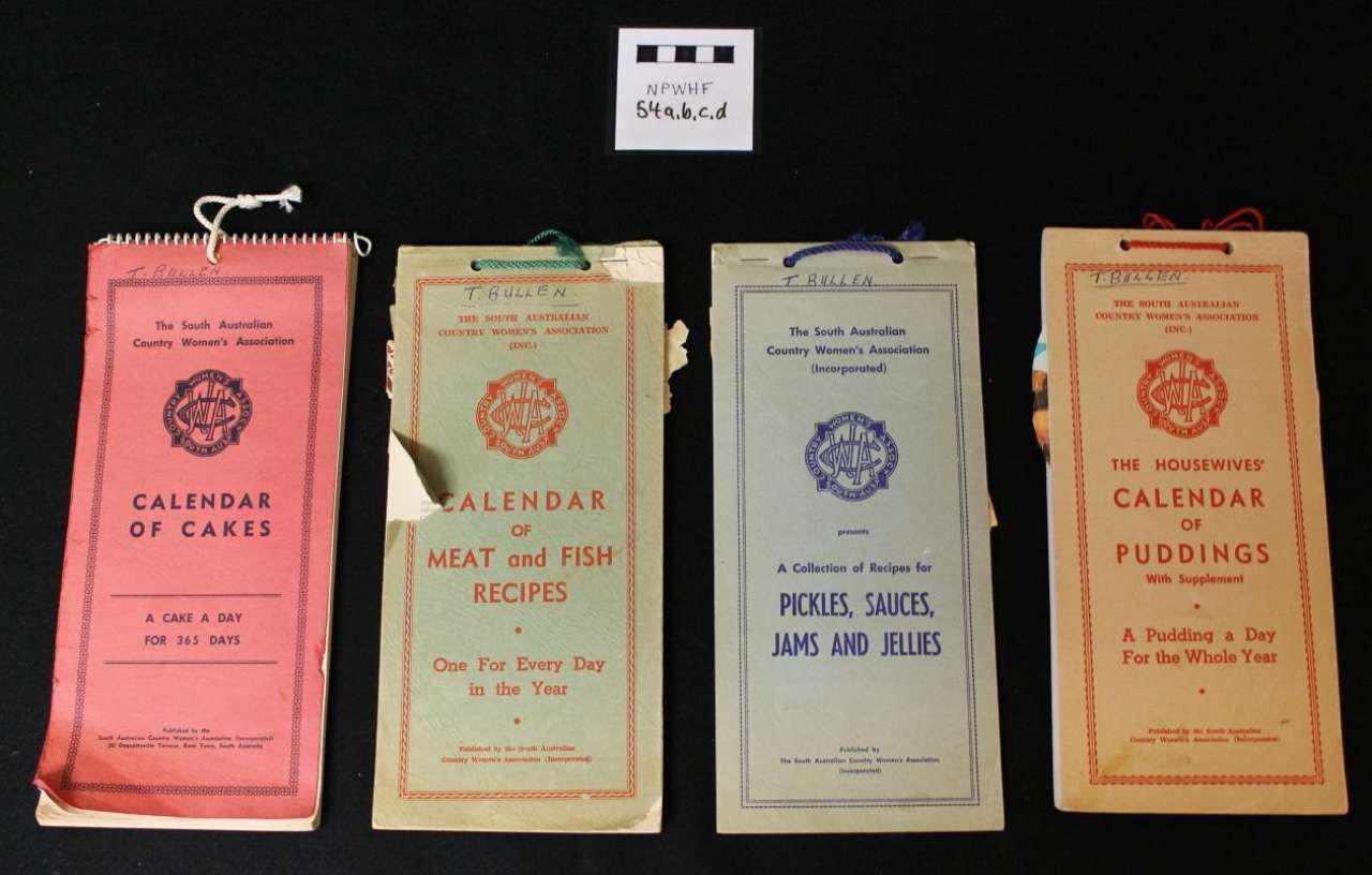 Four vintage-looking colorful packaged food boxes arranged in a row on a white background.