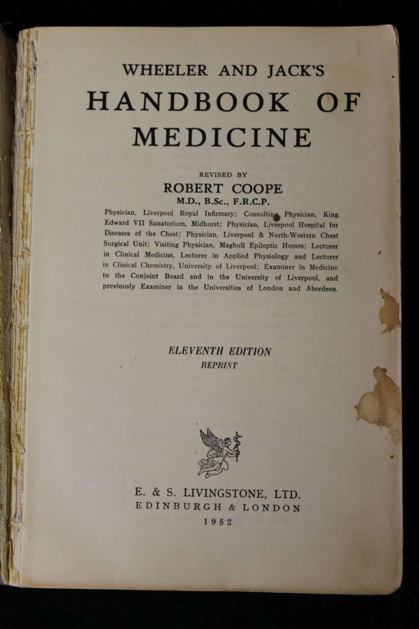 Vintage medical handbook cover titled “Wheeler and Jack’s Handbook of Medicine,” worn beige pages.