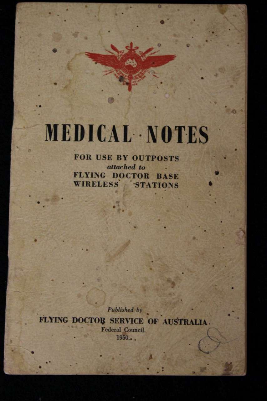 Beige cover of a medical notes booklet with a red caduceus and black title text.