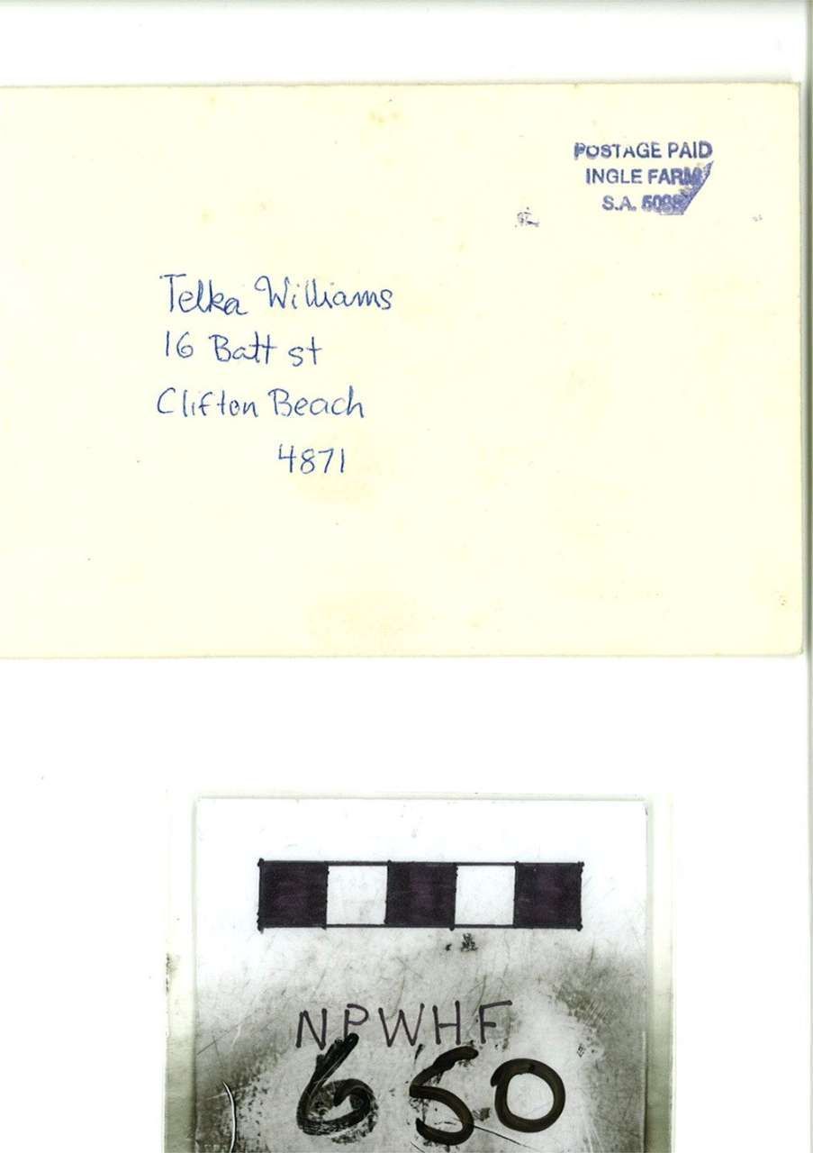 Pale yellow page with handwritten note and a small black-and-white film strip labeled “650” at the bottom.