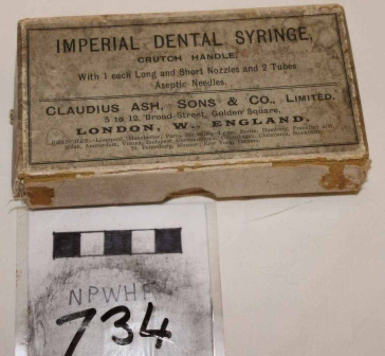 Old cardboard box labeled 