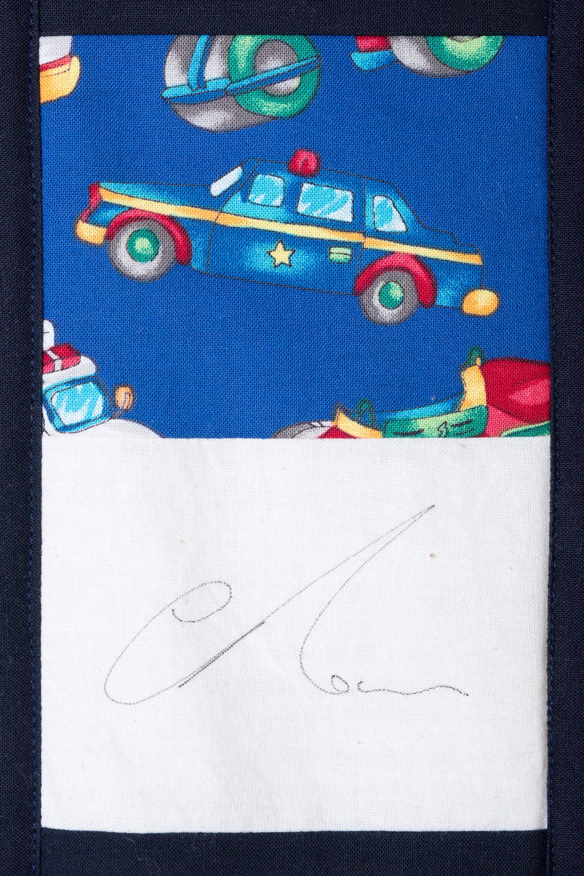 Children’s drawing of a blue car on a road above a blank white space