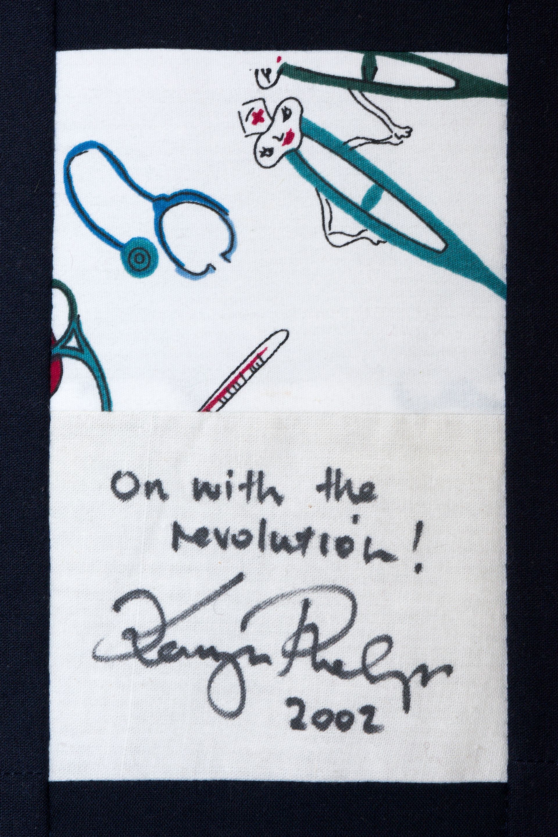 Signed 2002 handkerchief with stethoscope, pen, and text: “On with the revolution!”