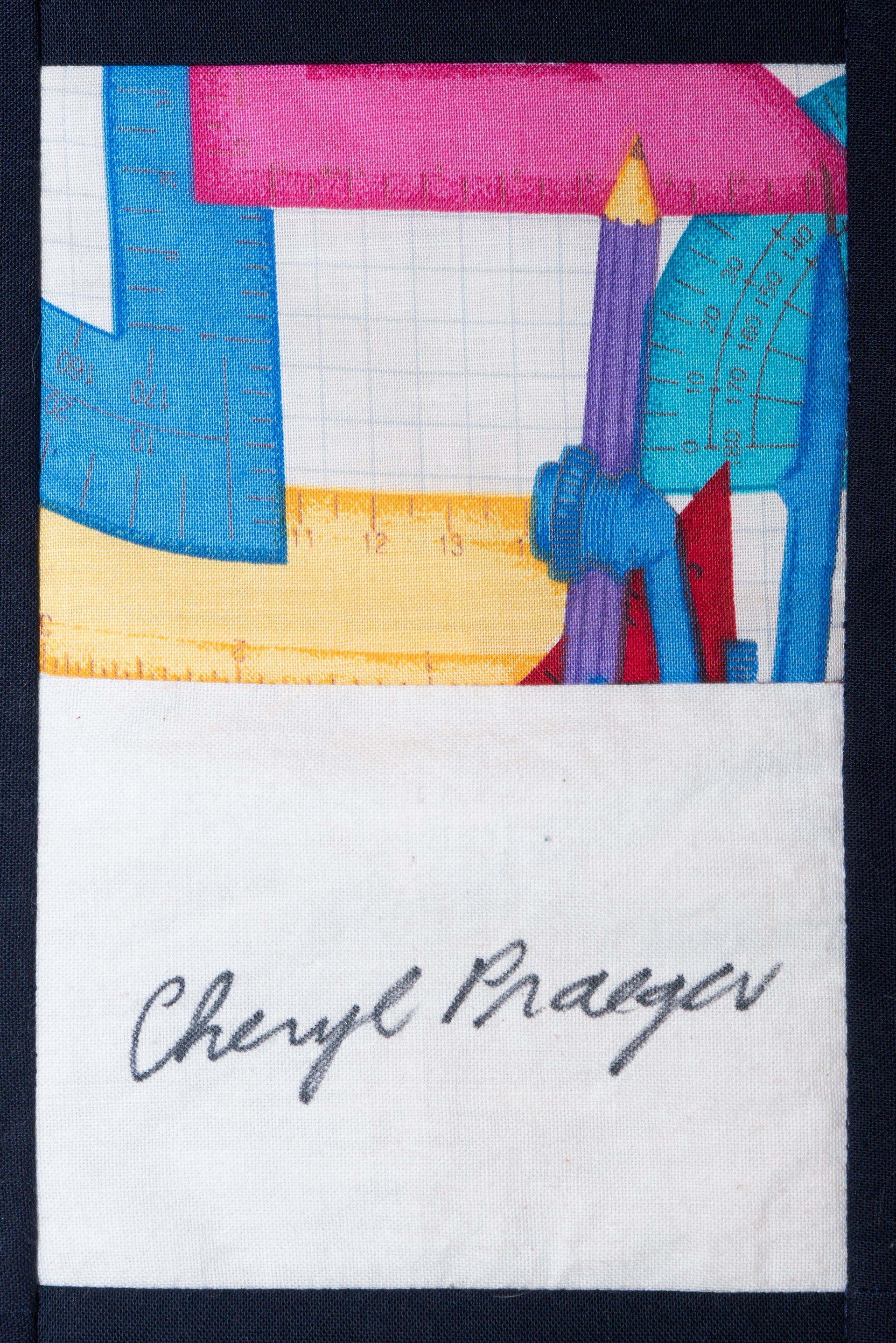 Colorful abstract artwork above a handwritten signature on white paper