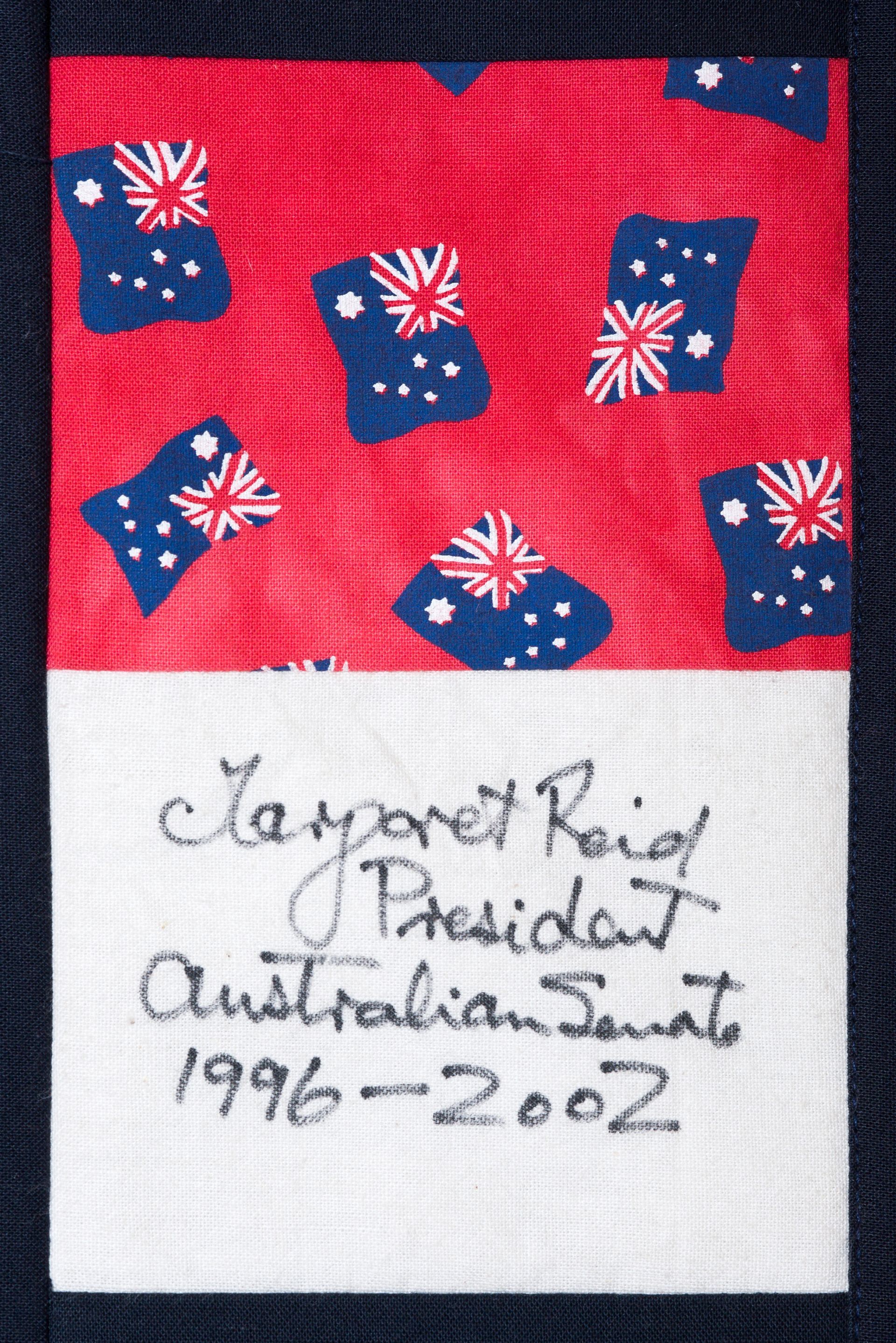 Australian flag patch with handwritten text: “Japanet Riz President Australia Sent 1996-2002”
