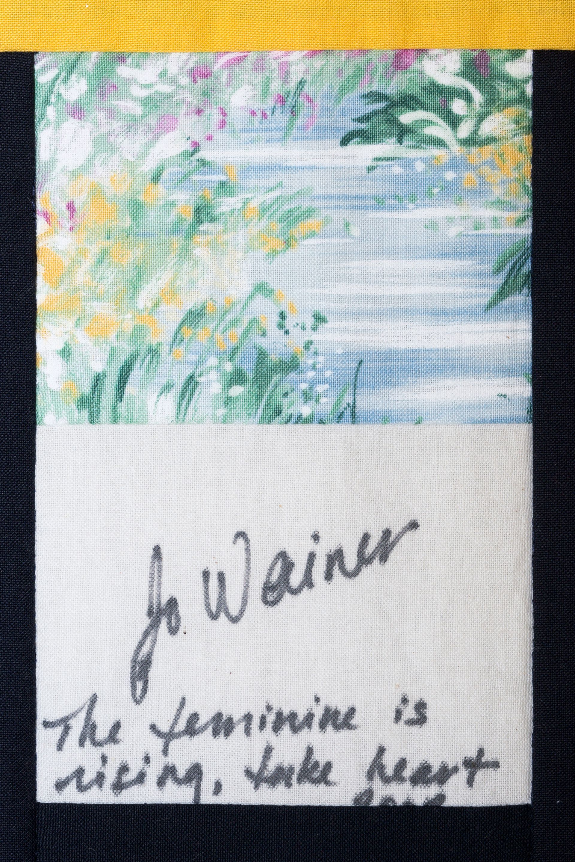 Handwritten note beneath a small pastel landscape painting on fabric, signed “J. Wainer.”