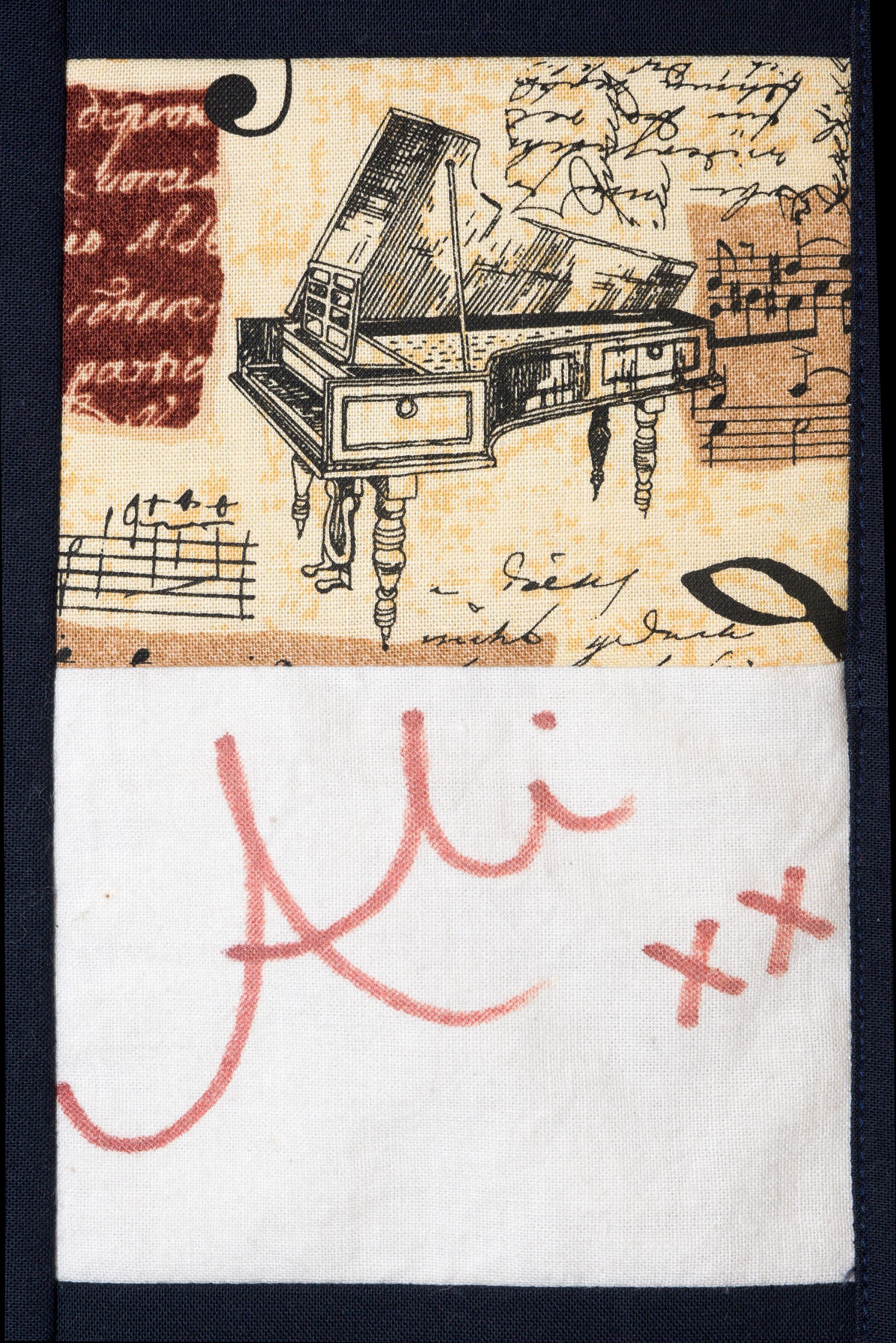 Close-up of a textile collage with a sketched piano, abstract marks, and pink “Hi xx” graffiti on white fabric
