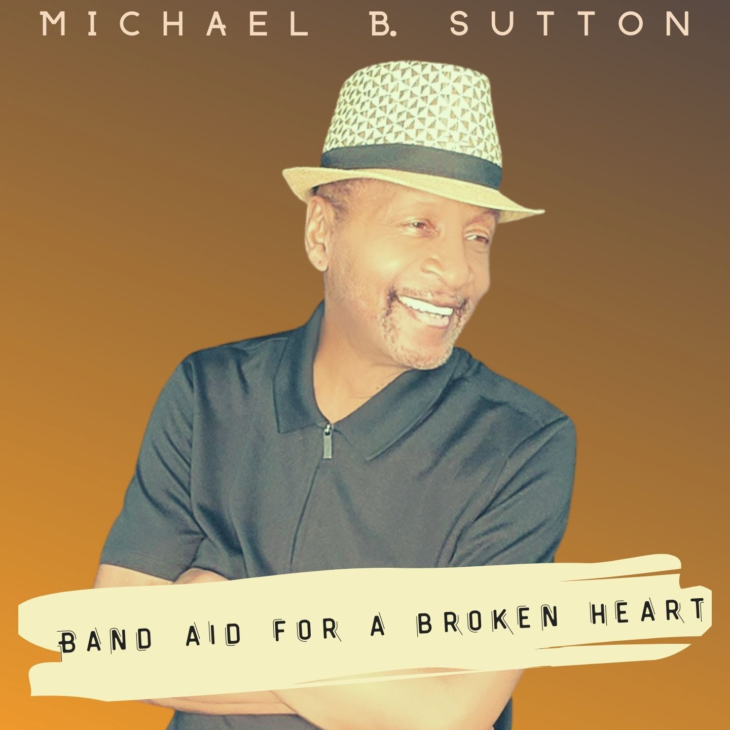 Album cover of a smiling man in a hat with text “Michael B. Sutton” and “Band Aid for a Broken Heart”