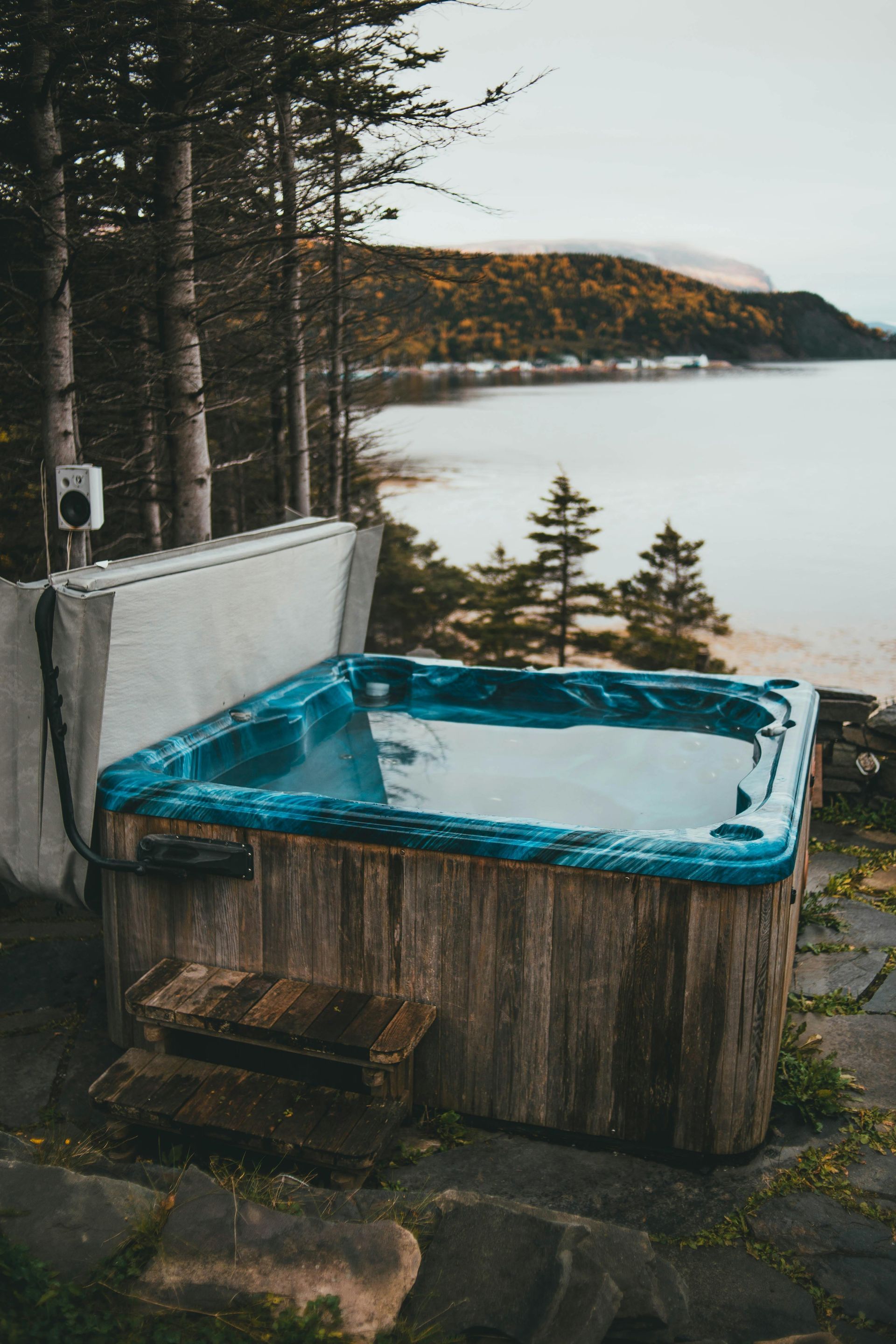 A swimming pool with a ladder attached to it
