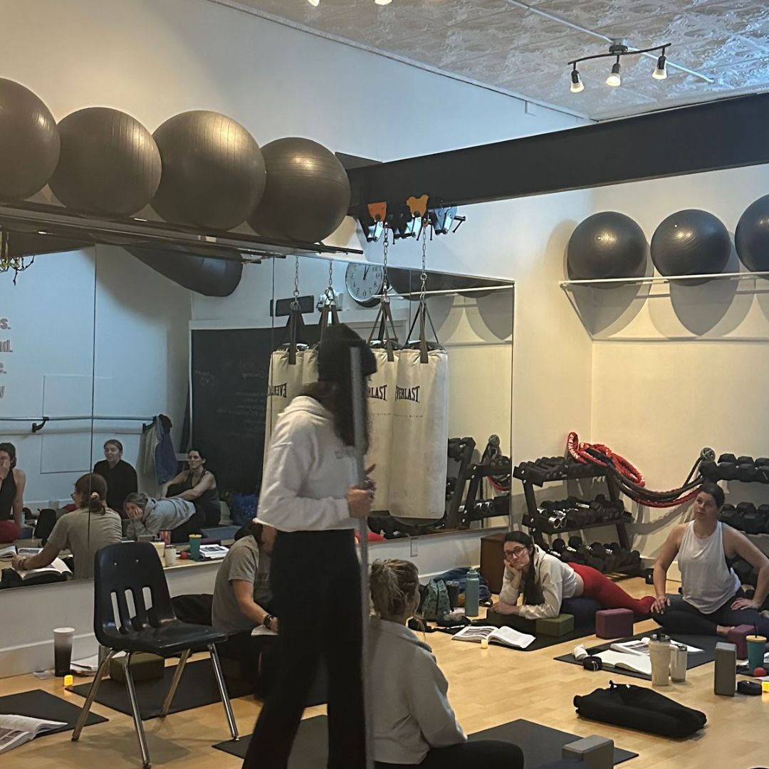 Room of people in a Yoga class