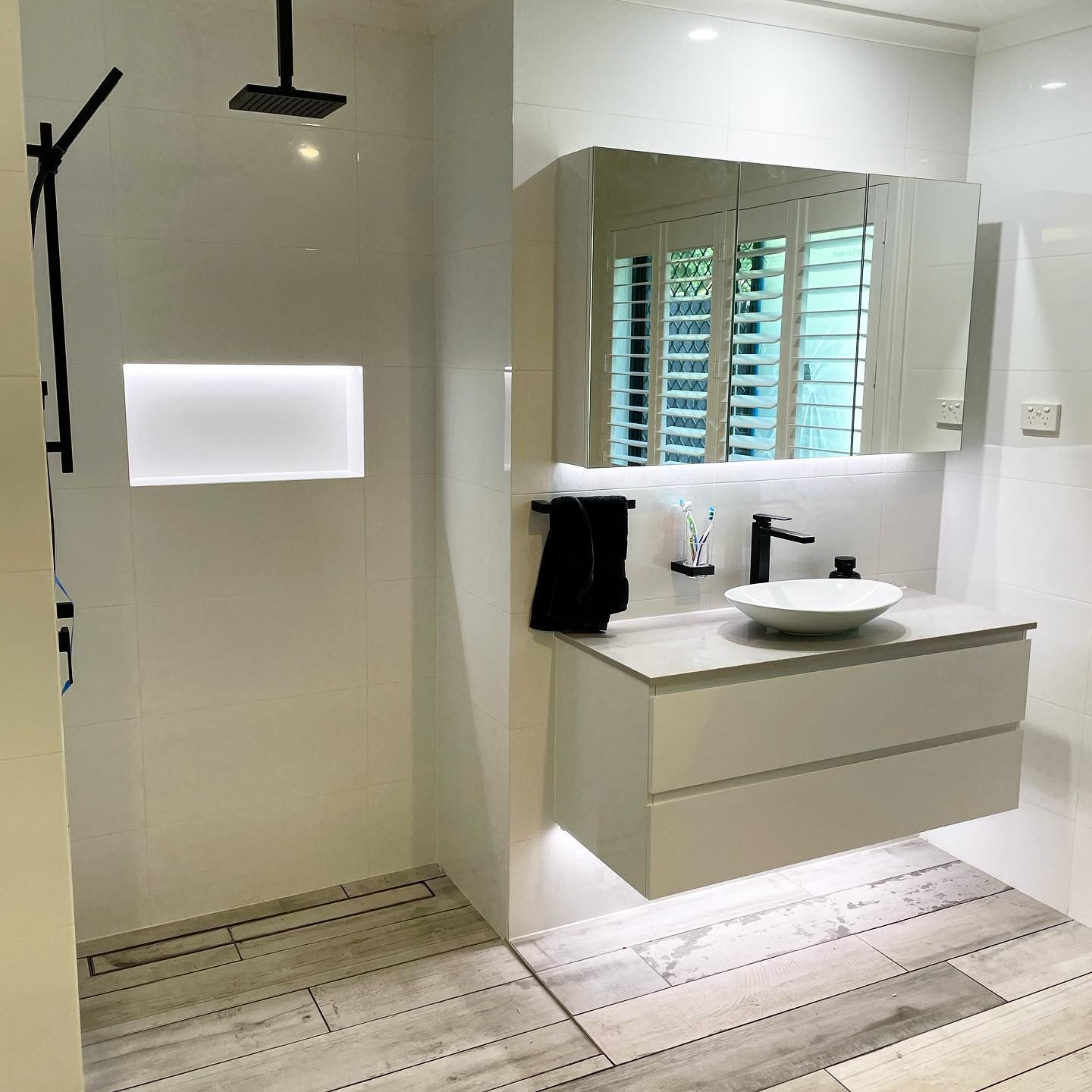 Modern Bathroom With Led Lighting Fit-outs — TB Electrical & Communications in West Gosford, NSW