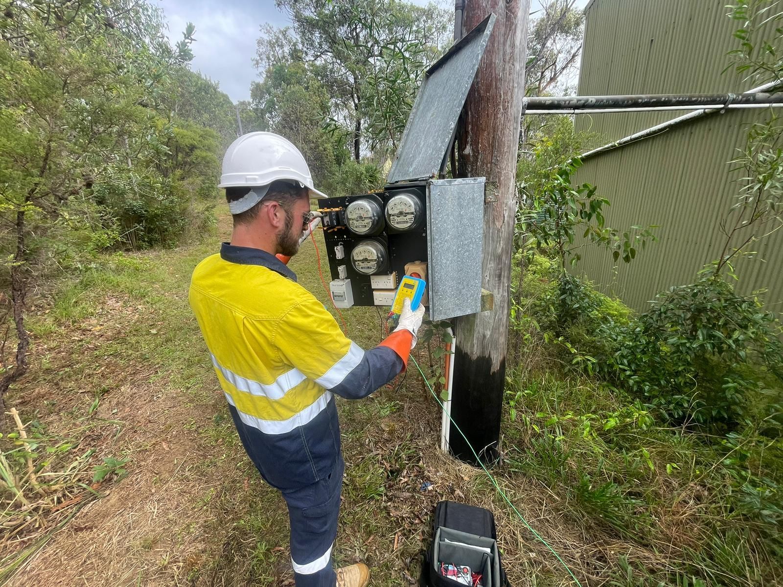 A Man is Working on an Electrical Pole — TB Electrical & Communications in West Gosford, NSW