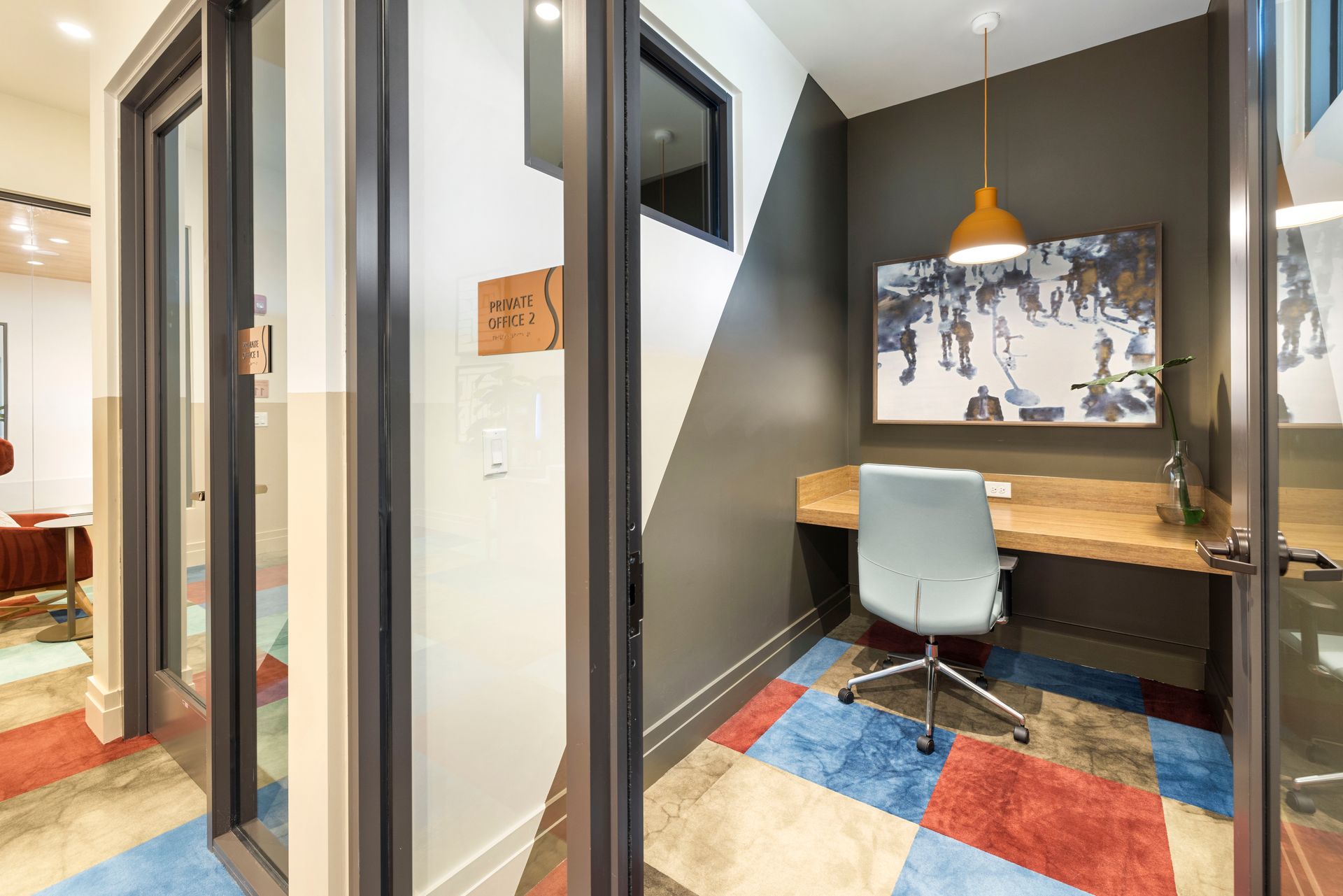 A room with a desk and a chair in it at Corsa at Estero Crossing.