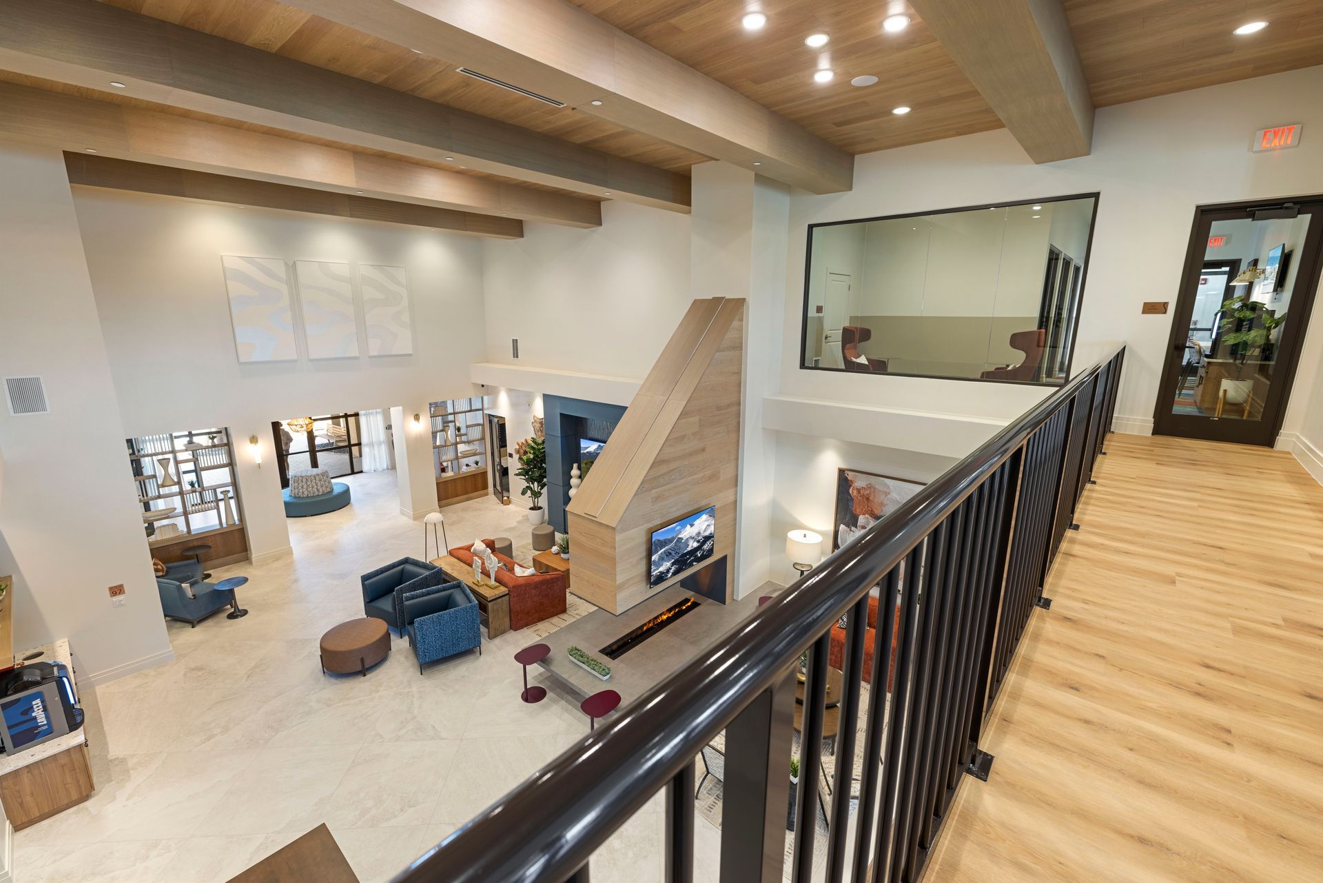 An aerial view of a hotel lobby with a balcony at Corsa at Estero Crossing.