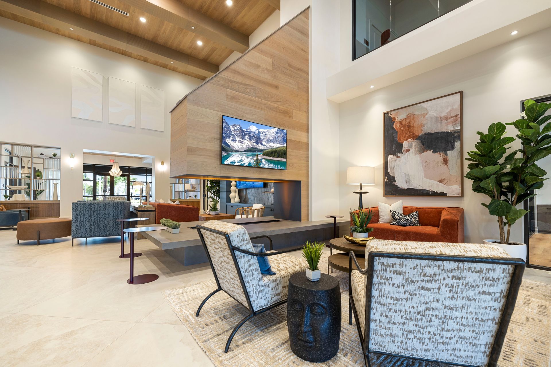A living room filled with furniture and a fireplace at Corsa at Estero Crossing.