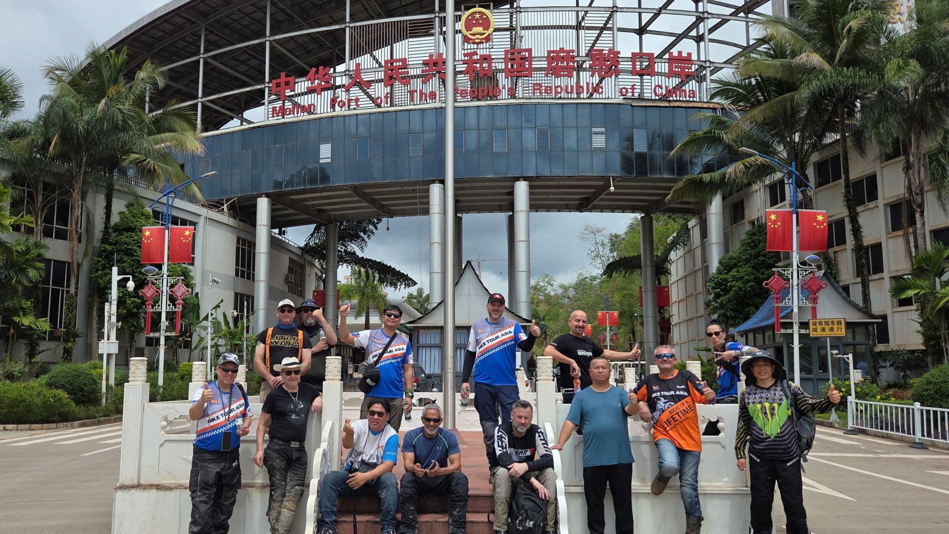 Bike Tour Asia team at the Boten - Mohan border 