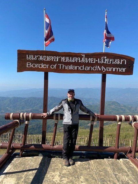 A guy at the border of thailand and myanmar view from the lanna motorbike tour
