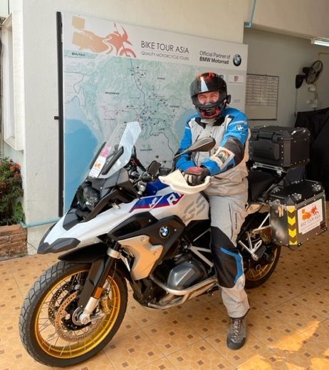 A man on a big bike at Bike Tour Asia Service Centre in Chiang Mai