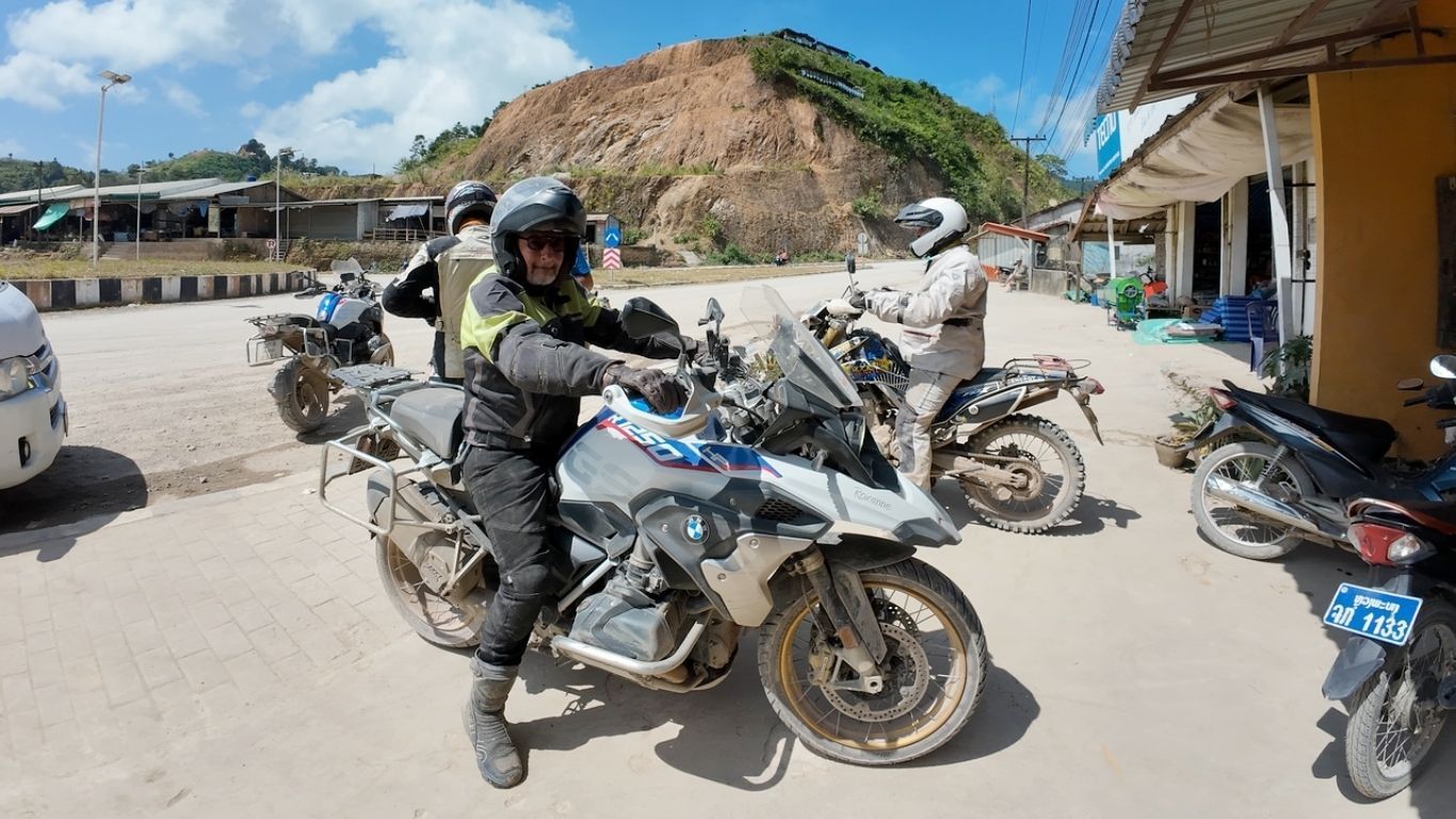 riders riding the motorbikes in Laos