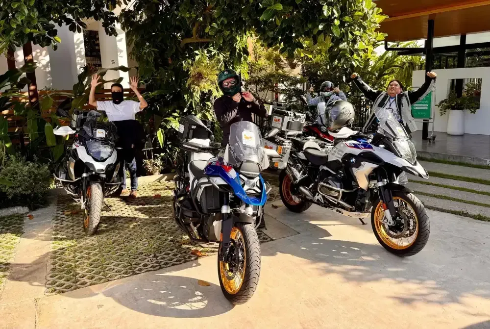 Bike Tour Asia riders with BMW R 1250 GS motorcycles preparing to start the Chiang Mai to Phuket tour in Thailand
