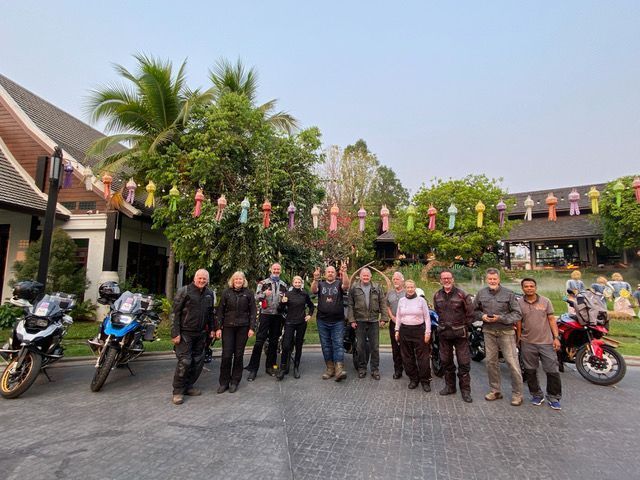 Motorcycle tour group gathered before departure in northern Thailand
