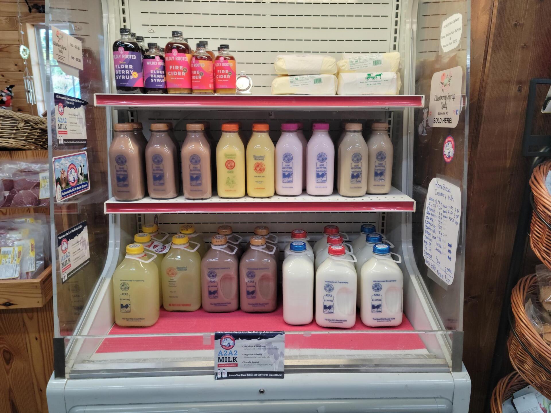 Assorted Bottles On Shelf — Mooresville, NC — Steven's Country Store & Butcher Shop