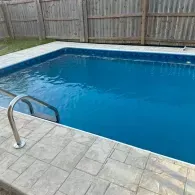 inground pool with ladder