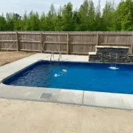 sprinkler features in inground pool