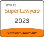 Super Lawyers badge with orange and gray text, “Rated by Super Lawyers 2023,” and “visit SuperLawyers.com” at bottom